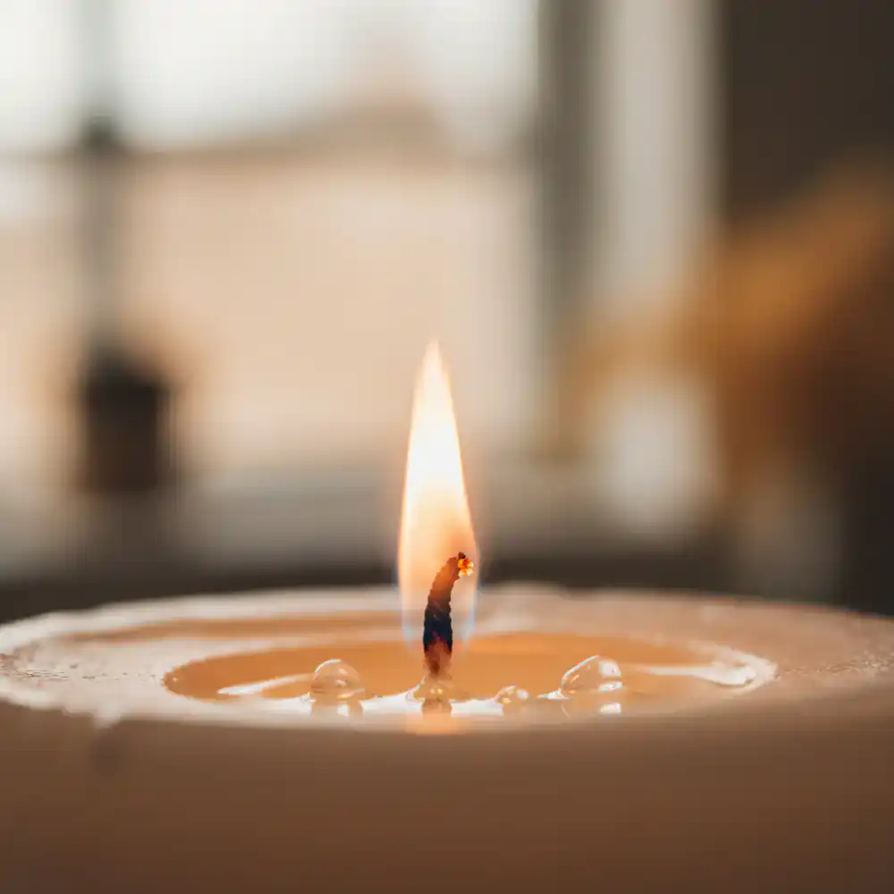 Close up of a lit candle wick